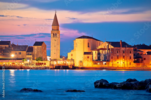 Town of Umag waterfront and coast evening view