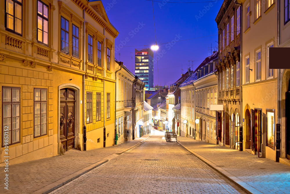 Zagreb. Radiceva old cobbled street and Zagreb cityscape advent evening view