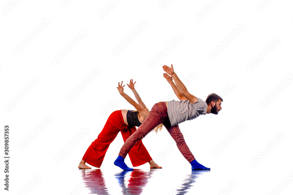Pair of dancers isolated on the white wall