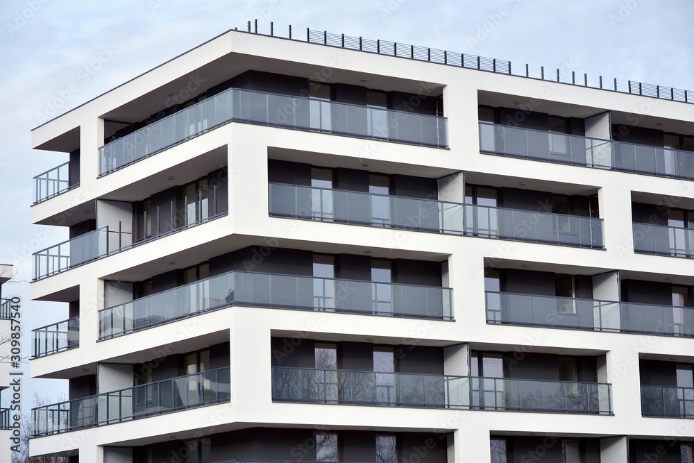 Modern and new apartment building. Multistoried modern, new and stylish living block of flats. Modern and new apartment building. Multistoried modern, new and stylish living block of flats.
