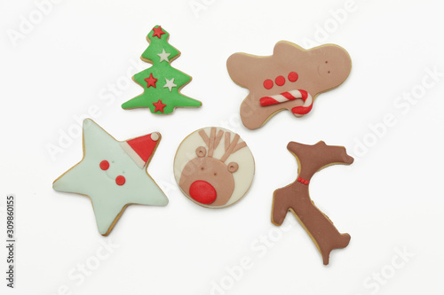 Flat lay of gingerbread Christmas cookies, Winter holidays decorated biscuits, cute royal icing cookies