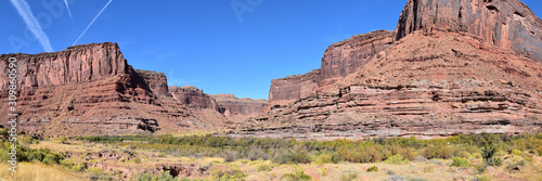 Moab Panorama views of Colorado River Highway UT 128 in Utah around Hal and Jackass canyon and Red Cliffs Lodge on a Sunny morning in fall. Scenic nature near Canyonlands and Arches National Park, 