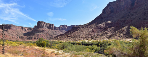 Moab Panorama views of Colorado River Highway UT 128 in Utah around Hal and Jackass canyon and Red Cliffs Lodge on a Sunny morning in fall. Scenic nature near Canyonlands and Arches National Park, 