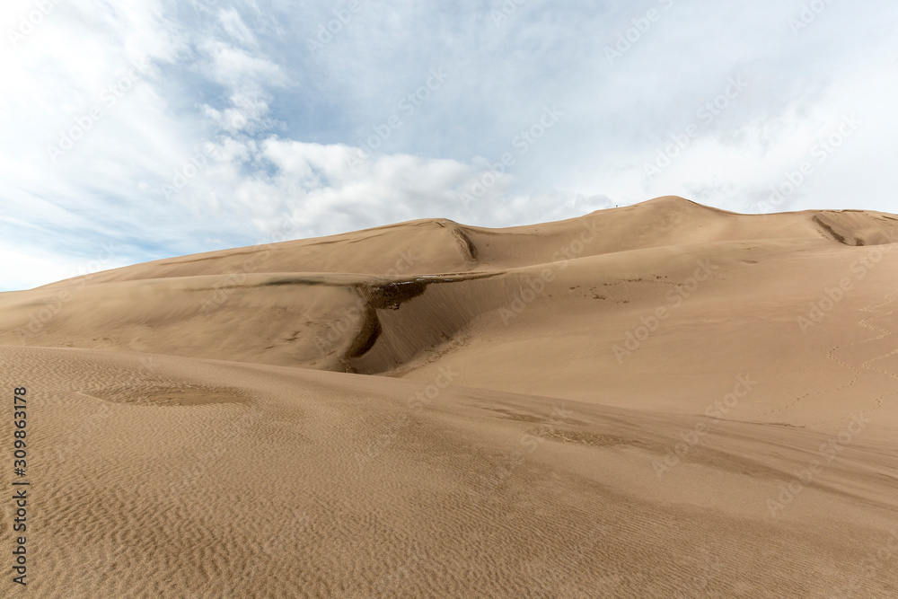Landscape view of dunes at Great Sand Dunes National Park in Colorado, the tallest sand dunes in North America.