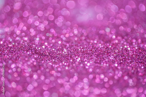 Pink and purple glitter, Defocused abstract holidays lights With Sparkle for background.