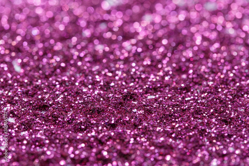 Pink and purple glitter, Defocused abstract holidays lights With Sparkle for background.