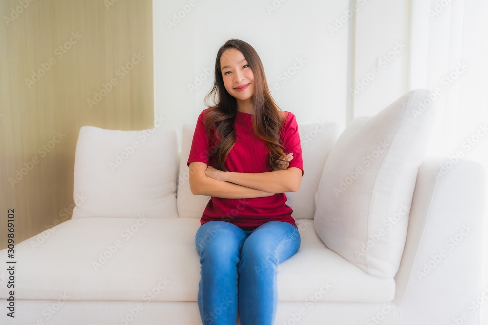 Portrait beautiful young asian women happy smile sit on sofa Portrait beautiful young asian women happy smile sit on sofa