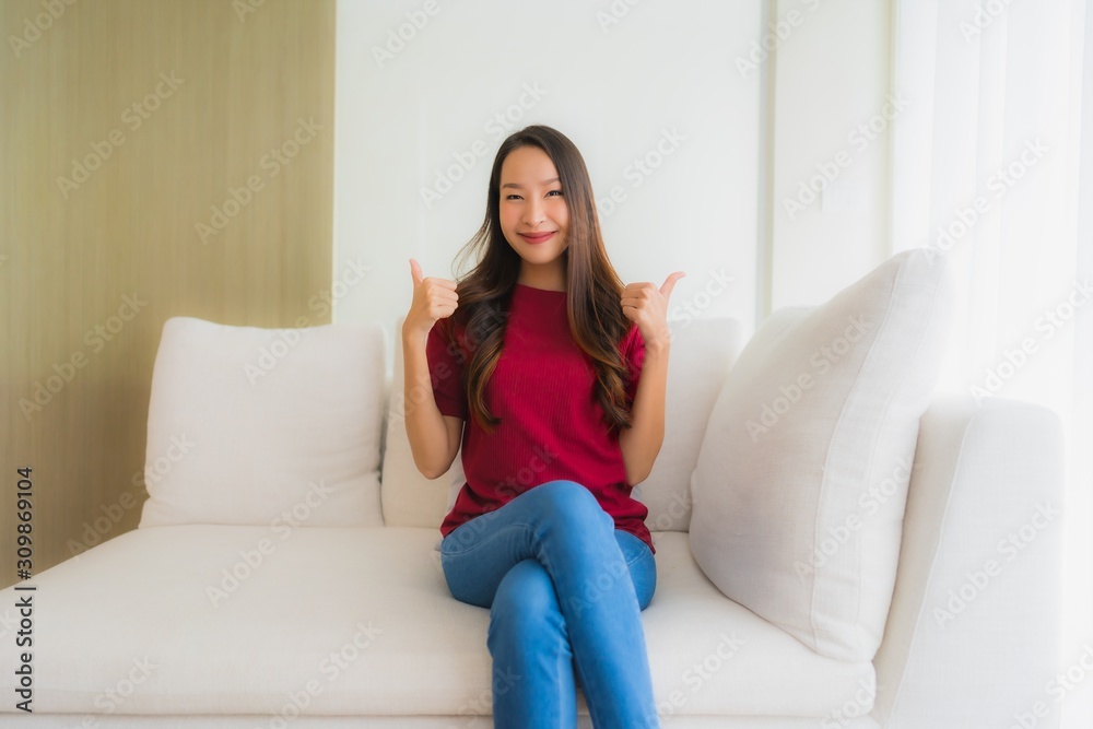 Portrait beautiful young asian women happy smile sit on sofa Portrait beautiful young asian women happy smile sit on sofa