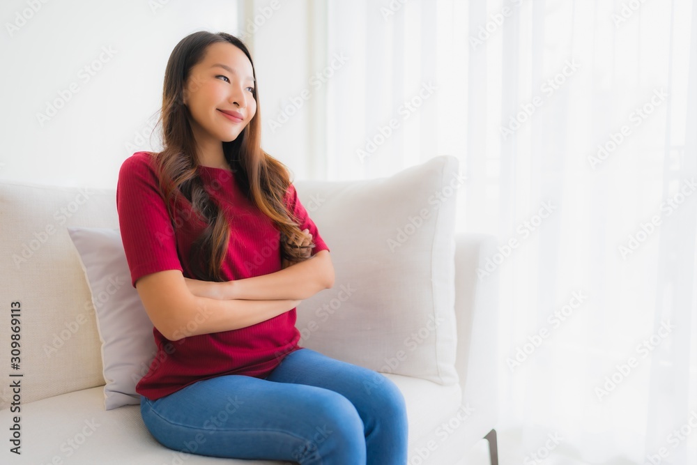 Portrait beautiful young asian women happy smile sit on sofa Portrait beautiful young asian women happy smile sit on sofa