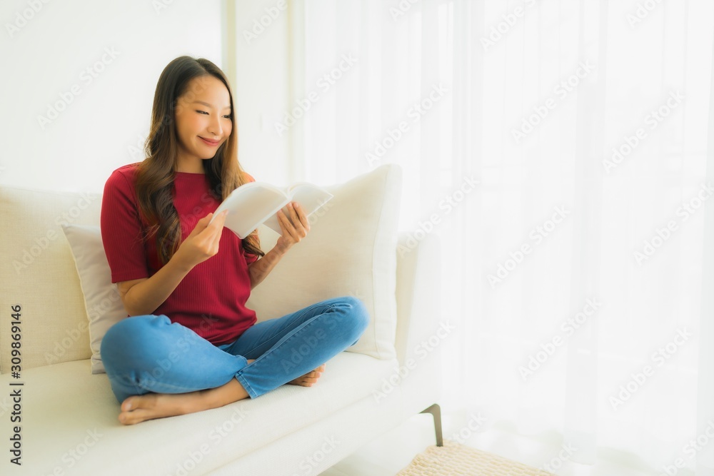 Portrait beautiful young asian women read book on sofa chair Portrait beautiful young asian women read book on sofa chair