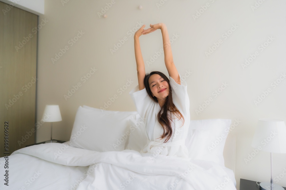 Portrait beautiful young asian women smile happy on bed Portrait beautiful young asian women smile happy on bed