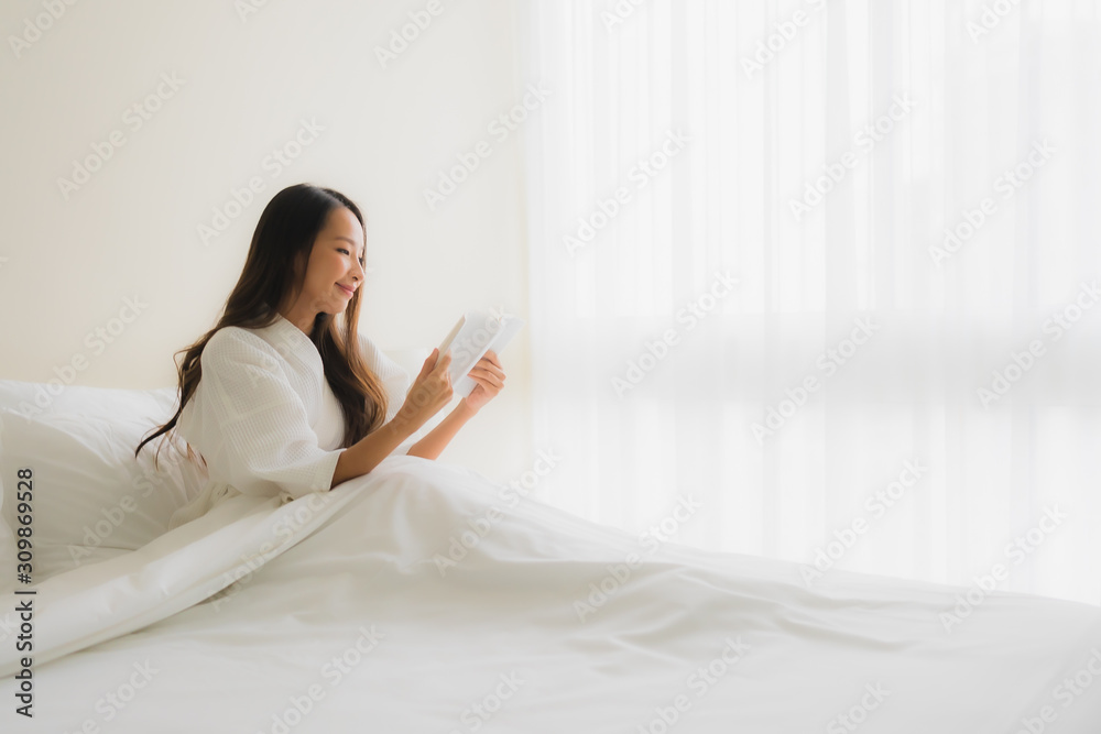 Portrait beautiful young asian women read book on bed Portrait beautiful young asian women read book on bed
