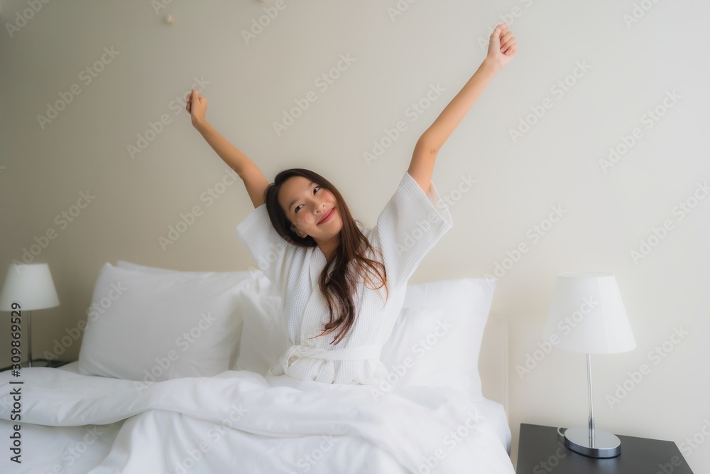 Portrait beautiful young asian women smile happy on bed Portrait beautiful young asian women smile happy on bed
