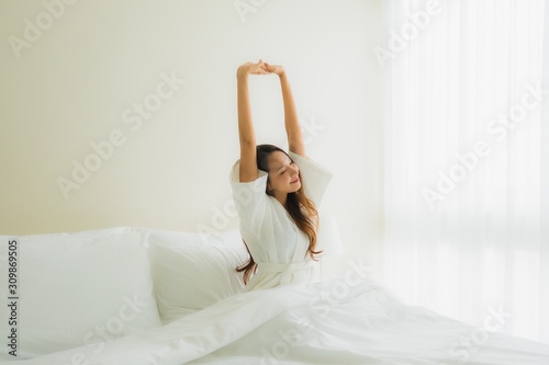 Wallpaper Mural Portrait beautiful young asian women smile happy on bed Torontodigital.ca