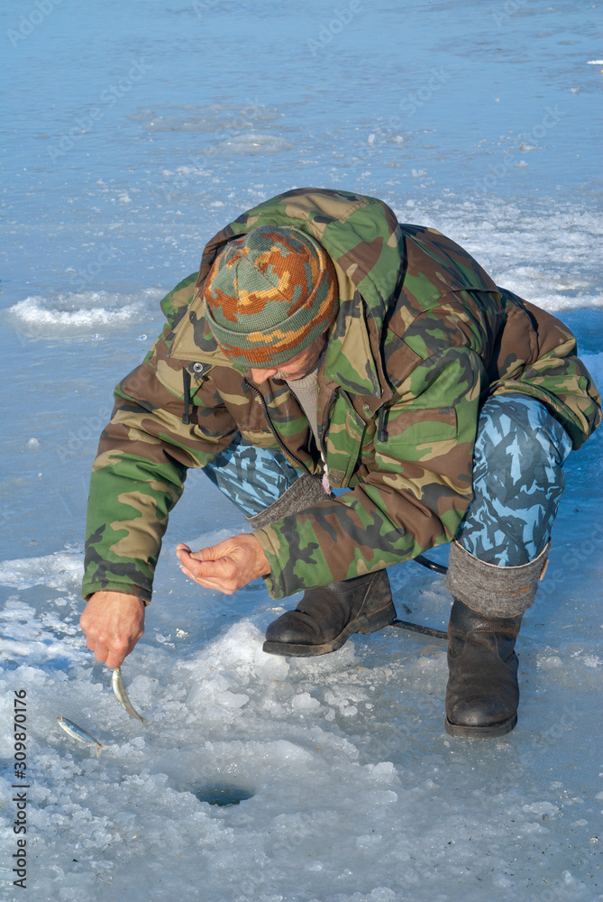 Man on winter fishing 36