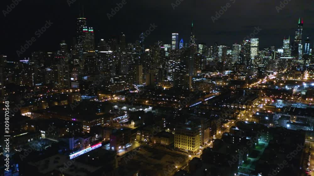 CTA Holiday Train Enters Downtown Chicago at Night - Aerial, 4k CTA Holiday Train Enters Downtown Chicago at Night - Aerial, 4k