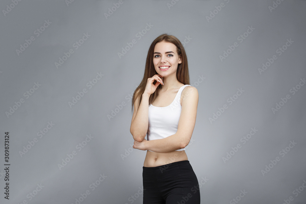 girl posing on gray background girl posing on gray background