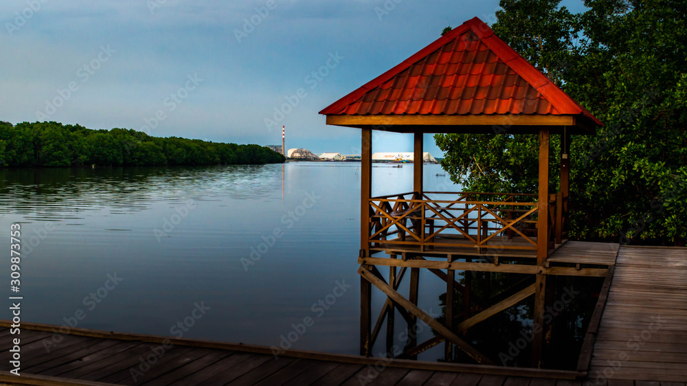 wooden gazebo in the riverbank at Kutai National Park wooden gazebo in the riverbank at Kutai National Park