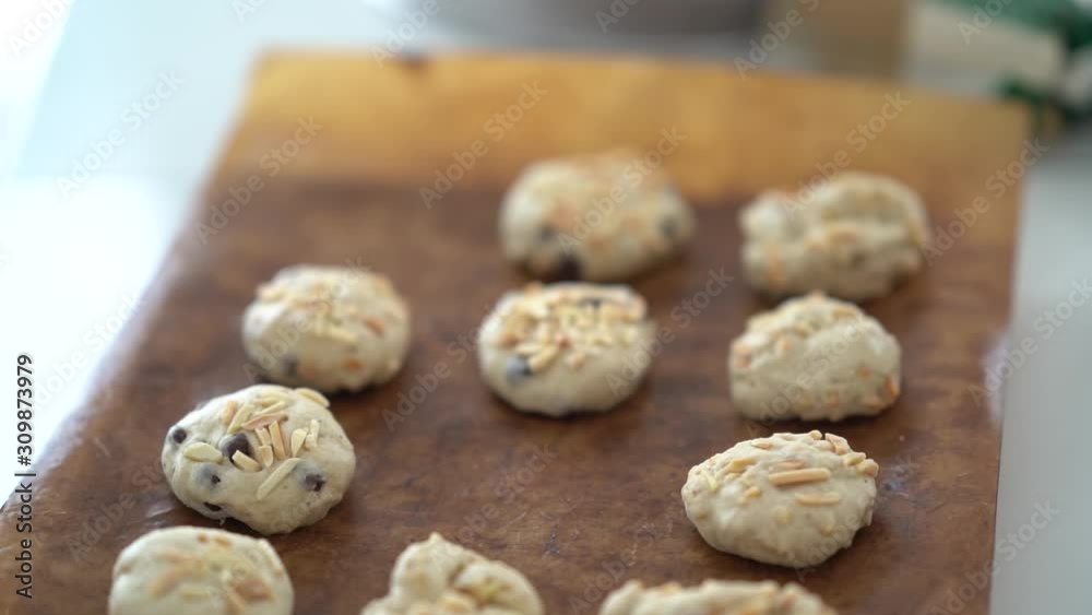 Woman hands making dough cookie.