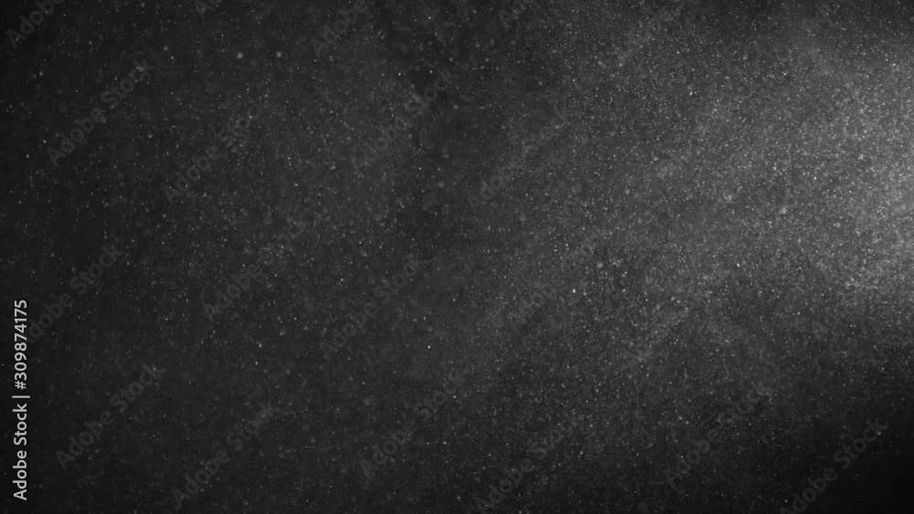 Natural Organic Dust Particles Floating On Black Background. Glittering Sparkling Particles Randomly Spin In The Air With Bokeh. Dynamic Particles With Fast And Slow Motion. Shimmering Dust In Space. Natural Organic Dust Particles Floating On Black Background. Glittering Sparkling Particles Randomly Spin In The Air With Bokeh. Dynamic Particles With Fast And Slow Motion. Shimmering Dust In Space.