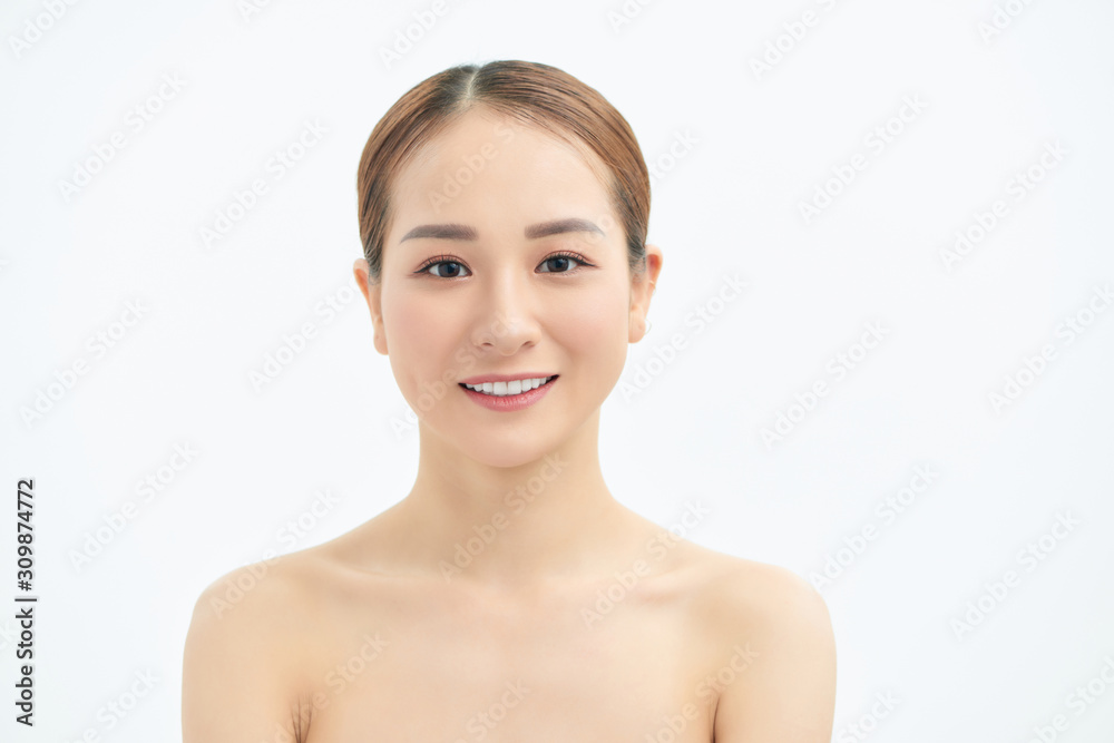 Portrait of young Asian woman with natural skin on white background. Portrait of young Asian woman with natural skin on white background.