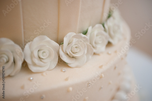wedding cake with white roses