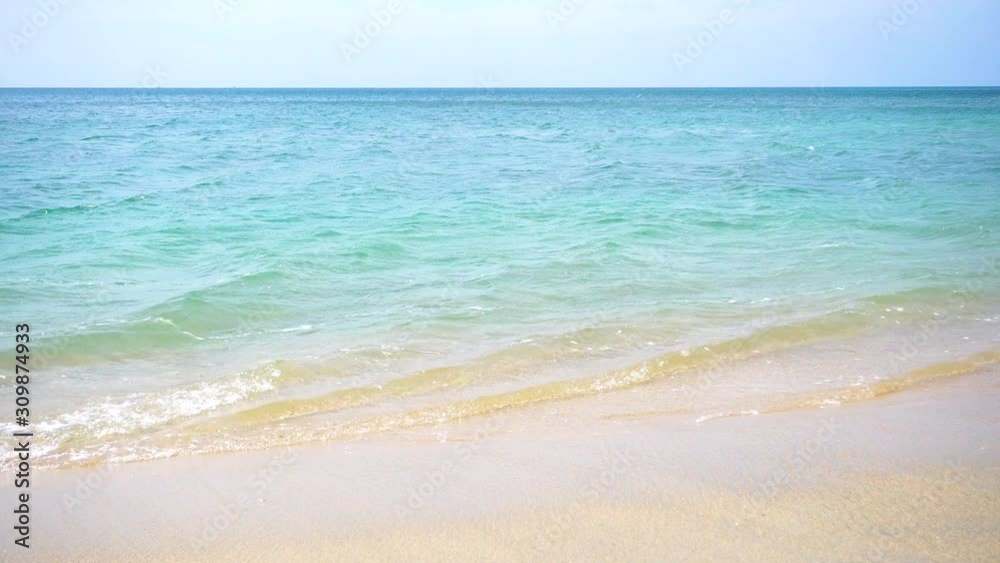 Beautiful tropical beach with blue sky and white cloud background. Summer vacation and nature environment concept. Beautiful tropical beach with blue sky and white cloud background. Summer vacation and nature environment concept.