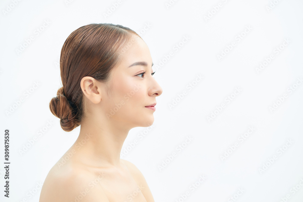 Beauty portrait of a young attractive half naked woman with perfect skin looking away isolated over white background Beauty portrait of a young attractive half naked woman with perfect skin looking away isolated over white background