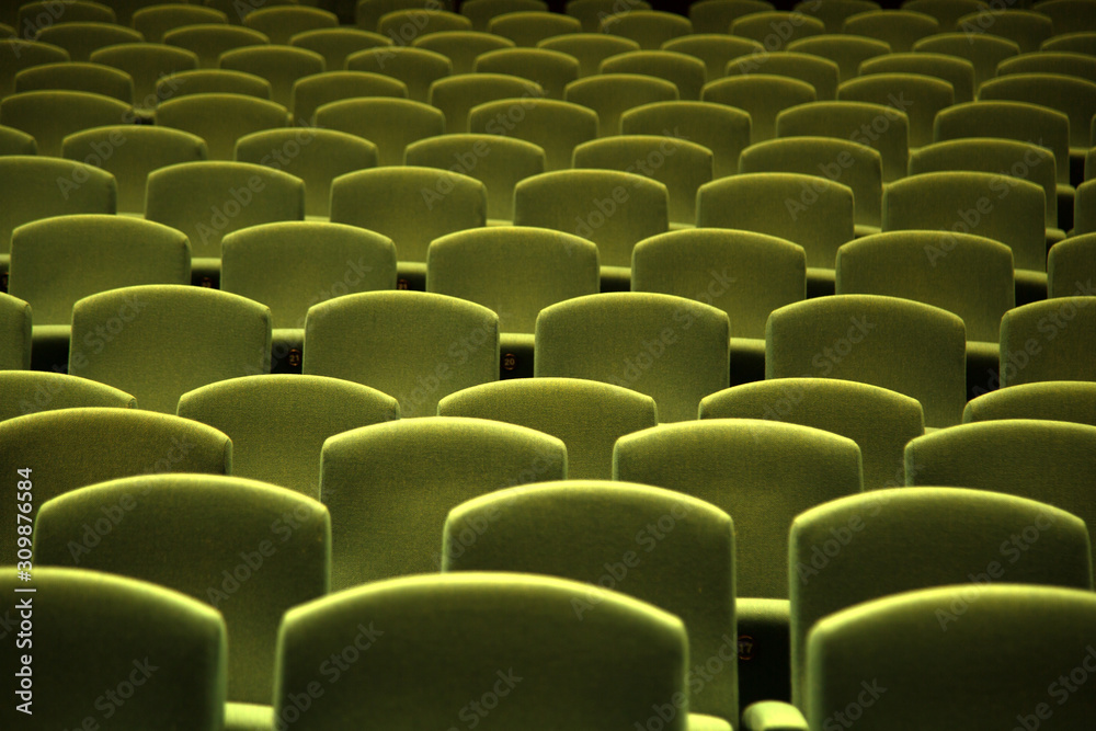 Obraz premium Green velvet seat in a theater