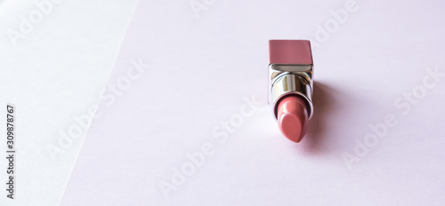 Lipstick on pink background.
