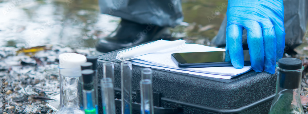 Εκτύπωση καμβά close-up of a scientist's hand in blue protective gloves, against the background