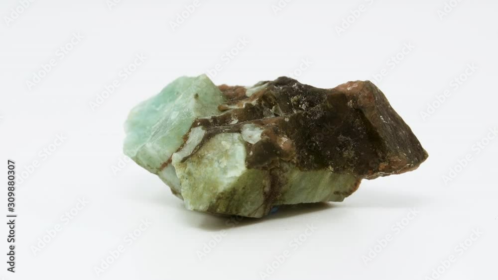 Close view of raw, low grade emerald mineral. Rotating front to back. Close view of raw, low grade emerald mineral. Rotating front to back.