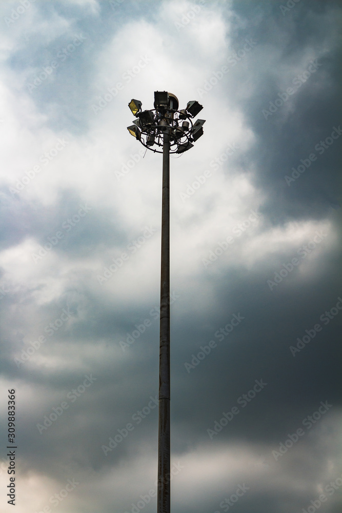 Lighting poles on the highway. This tall highway light pole makes driving at night safe.