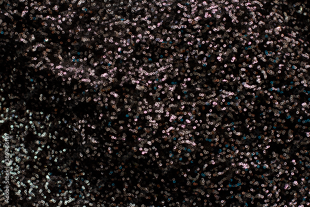 Fototapeta premium silver color shimmers with black shiny sequins background