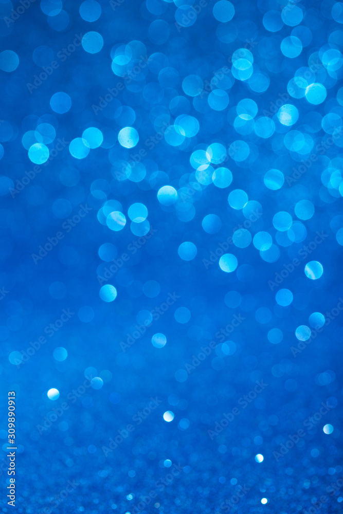 Beautiful blue bokeh background. Color of the year 2020.