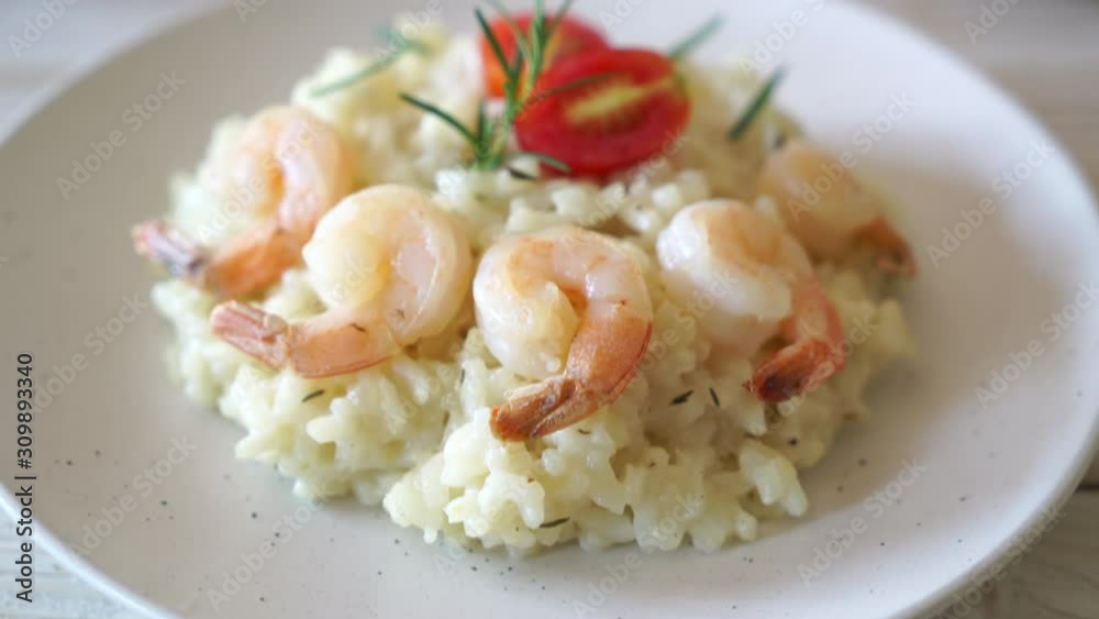 Italian risotto with shrimps - Italian food style Italian risotto with shrimps - Italian food style