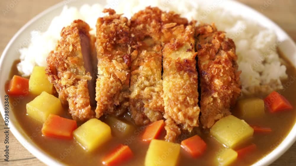 Crispy fried pork cutlet with curry and rice Crispy fried pork cutlet with curry and rice