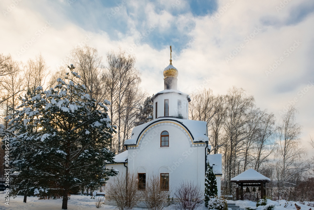Winter view of the Chapel of St. Michael the Archangel   in the village of Uspenskoe. Moscow region, Odintsovo city district, Russia.