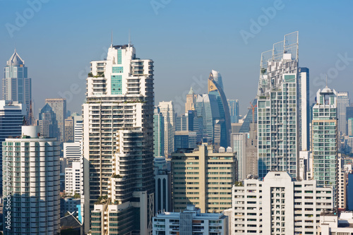 Bangkok, Thailand – December 21, 2019 : Office Buildings, city and condominiums Area in Bangkok, Office Building in City, Modern Building, Businesses Building. Sky view from Asoke area. with blue sky. © sky studio