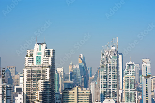 Bangkok, Thailand – December 21, 2019 : Office Buildings, city and condominiums Area in Bangkok, Office Building in City, Modern Building, Businesses Building. Sky view from Asoke area. with blue sky. © sky studio