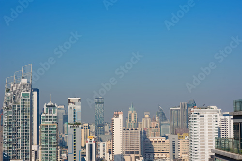 Bangkok, Thailand – December 21, 2019 : Office Buildings, city and condominiums Area in Bangkok, Office Building in City, Modern Building, Businesses Building. Sky view from Asoke area. with blue sky.