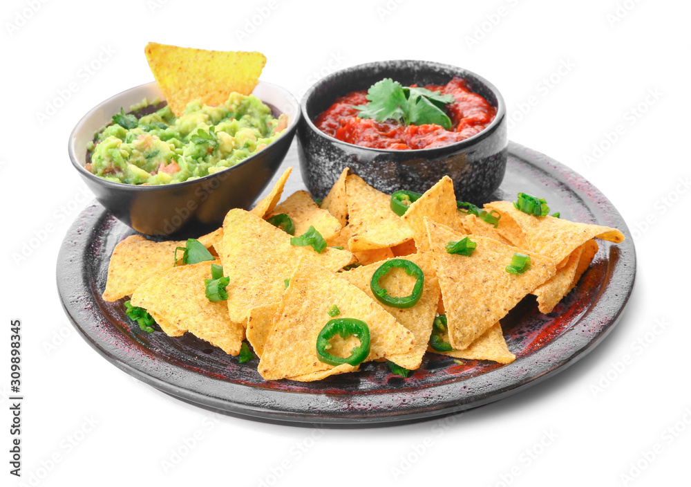 Plate with tasty nachos and sauces on white background Plate with tasty nachos and sauces on white background