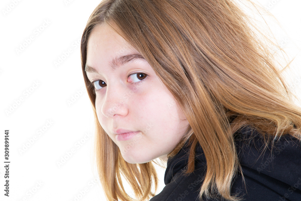 Teenage girl portrait closeup blond in black sweater