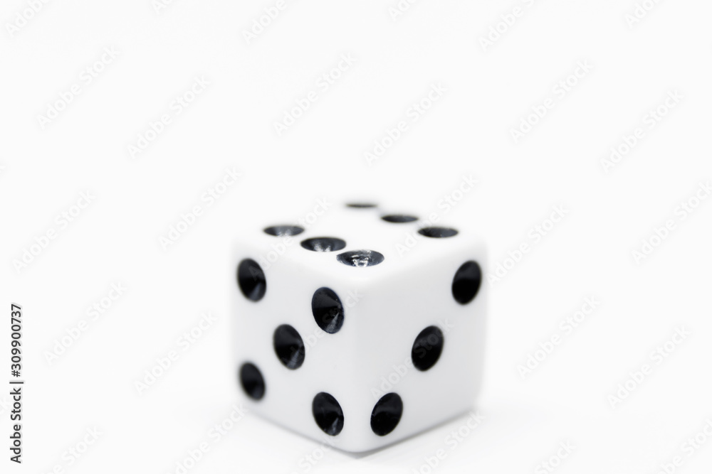 a plain white dice on white background in close up a plain white dice on white background in close up