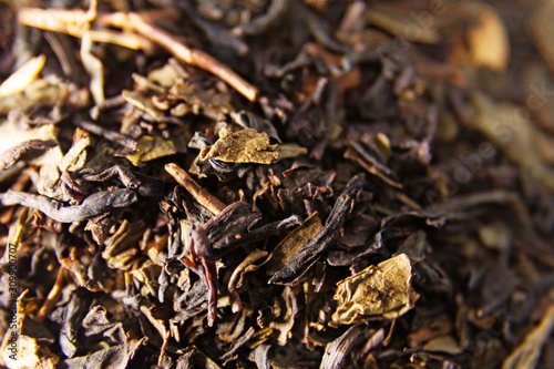 a small pile of loose tea on white background