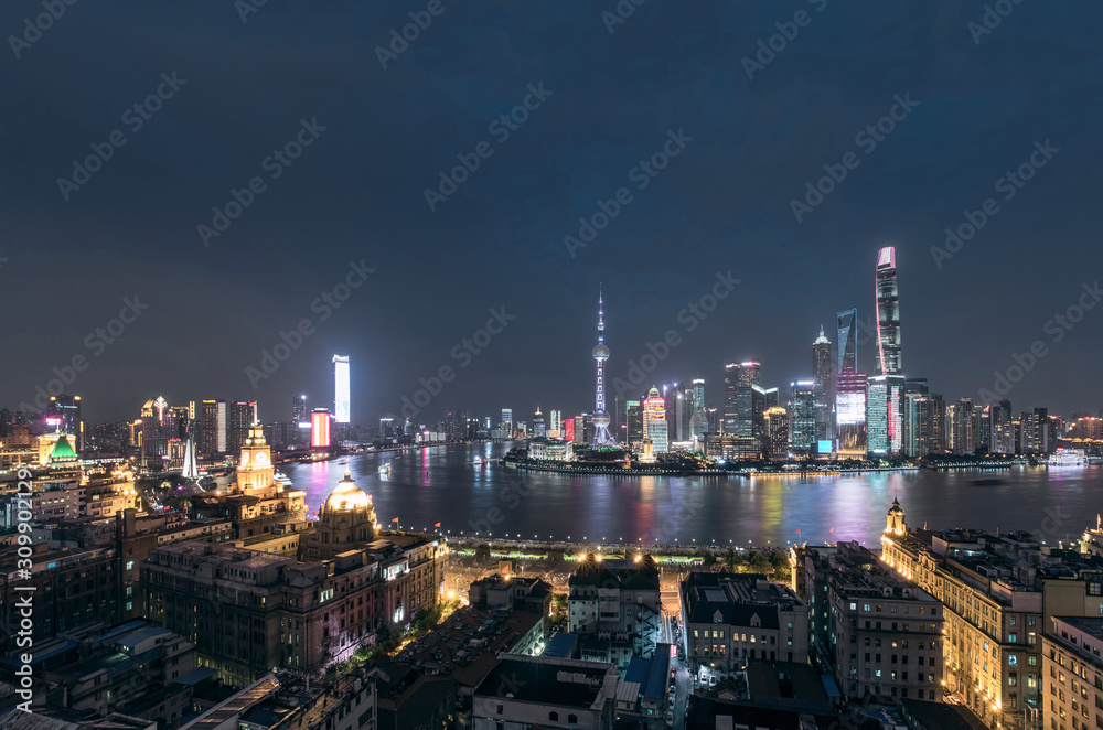 Shanghai skyline and cityscape	at night.