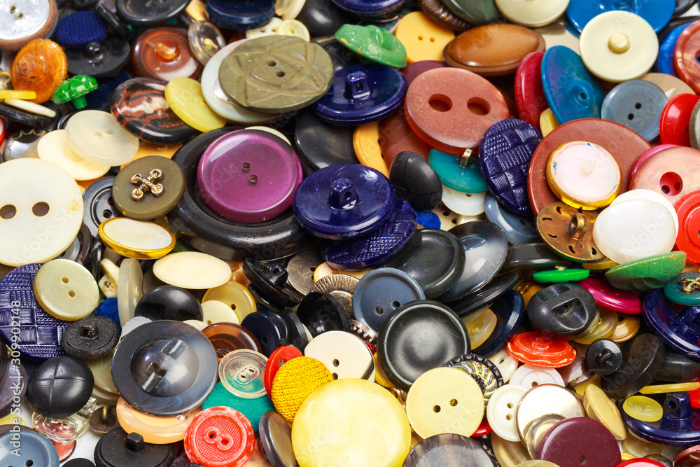collection of various colored buttons background . collection of various colored buttons background .