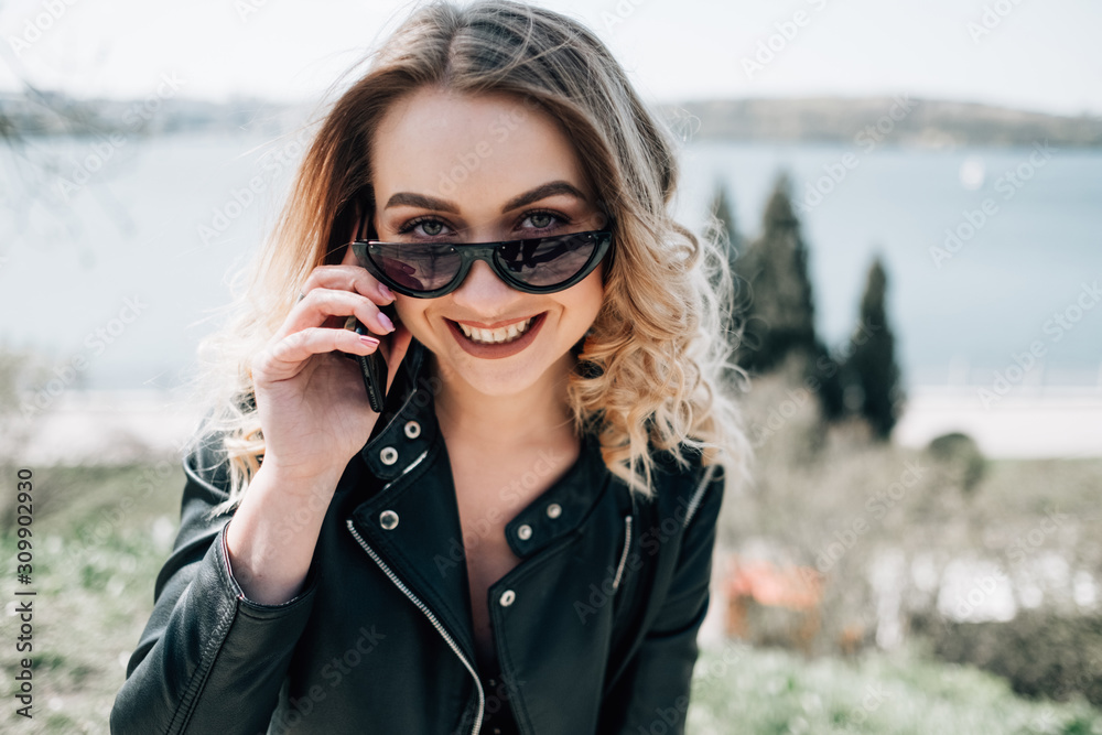 Portrait of Stylish Young Woman in Black Leather Jacket Portrait of Stylish Young Woman in Black Leather Jacket