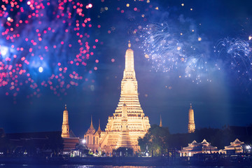 Wat Arun temple in bangkok with fireworks. New year and holiday concept.