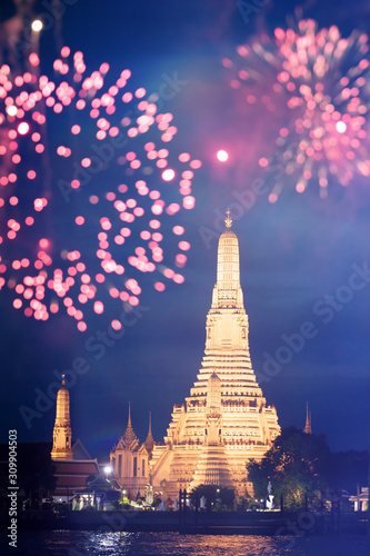 Wat Arun temple in bangkok with fireworks. New year and holiday concept.